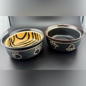 2 small dog dishes. Chic tiger print and bone print. 5”